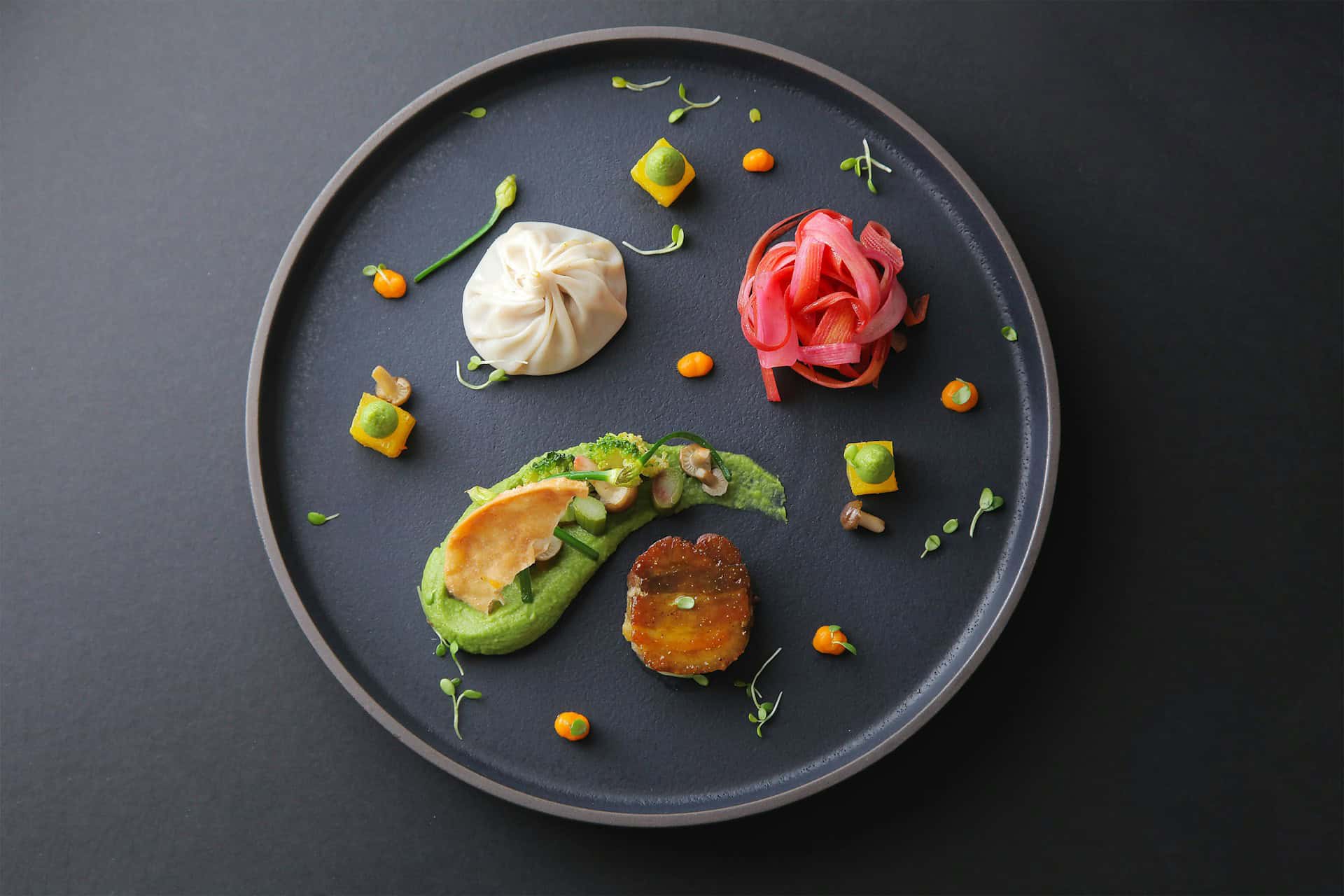 Modern restaurant dishes showcasing contemporary culinary trends and creative plating